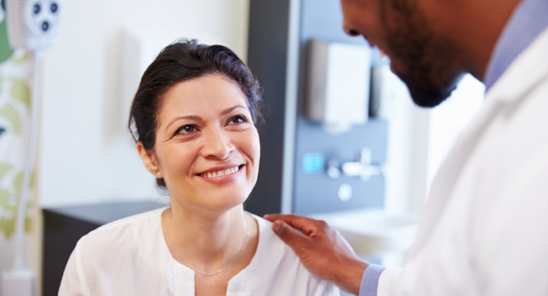 Woman speaking with a doctor